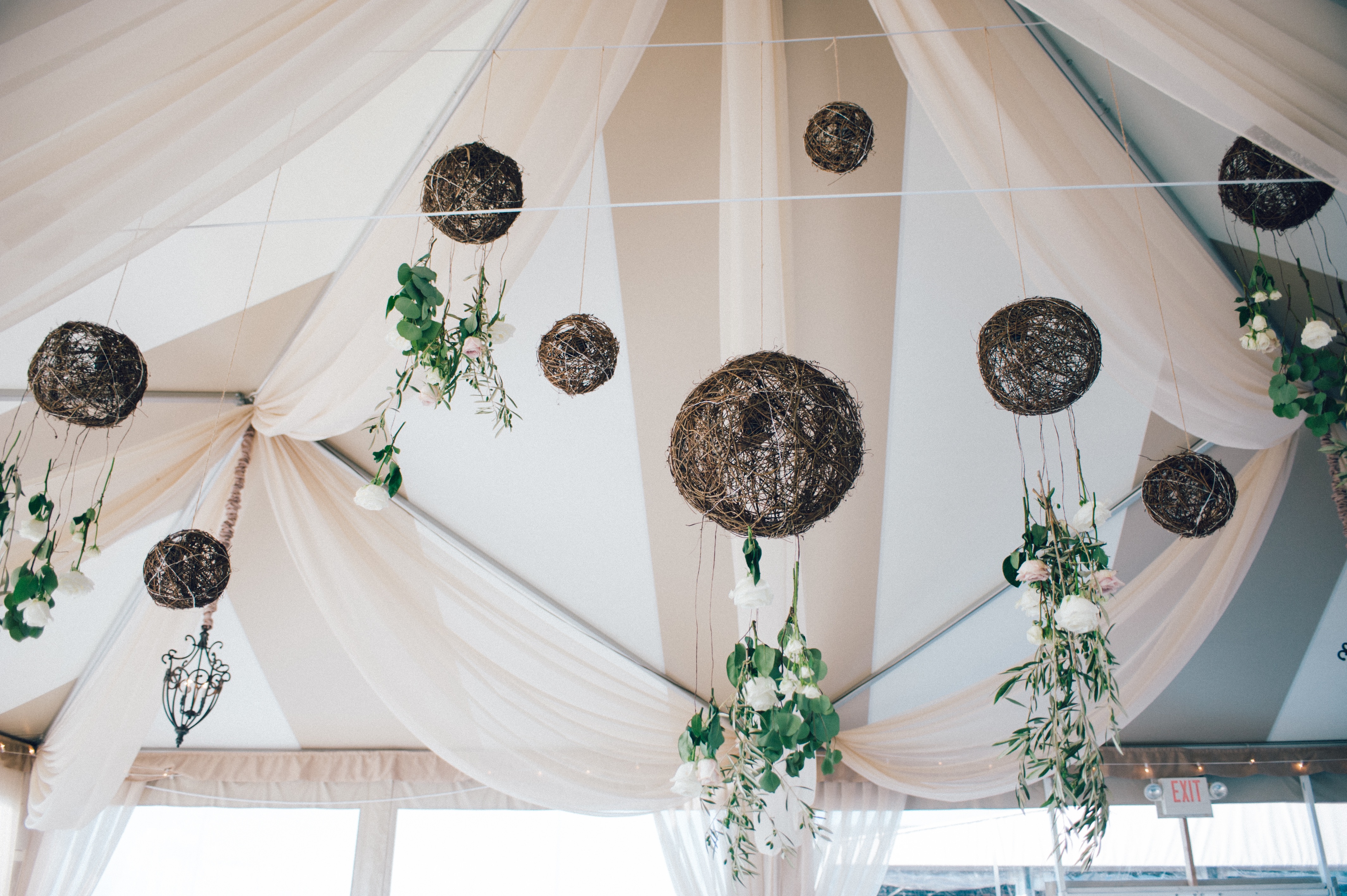 flou(-e)r Specialty Floral Events Ocean Cliff Tented Beach Wedding Floral Chandelier