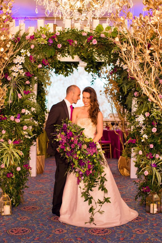 flou(-e)r_specialty_floral_events_wedding_arch_candles