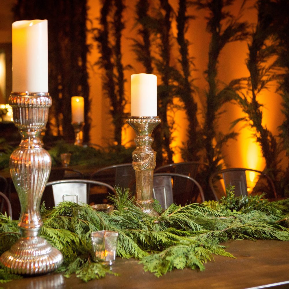flou(-e)r_specialty_floral_events_holiday_decorating_candles_greens