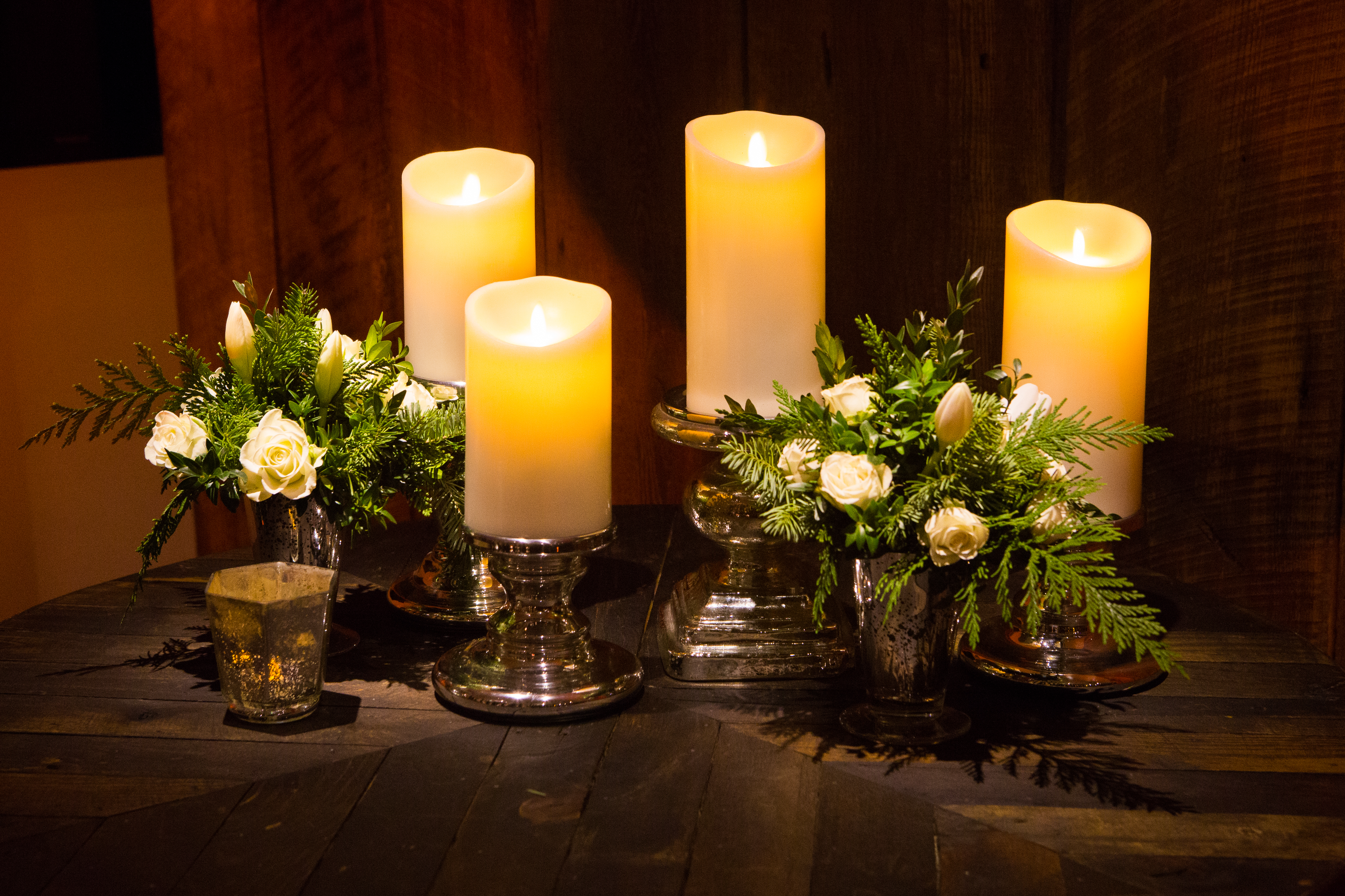 flou(-e)r_specialty_floral_events_holiday_decorating_candles_greens