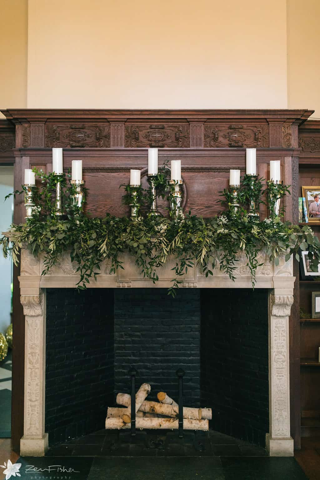 wedding fireplace candles and flowers