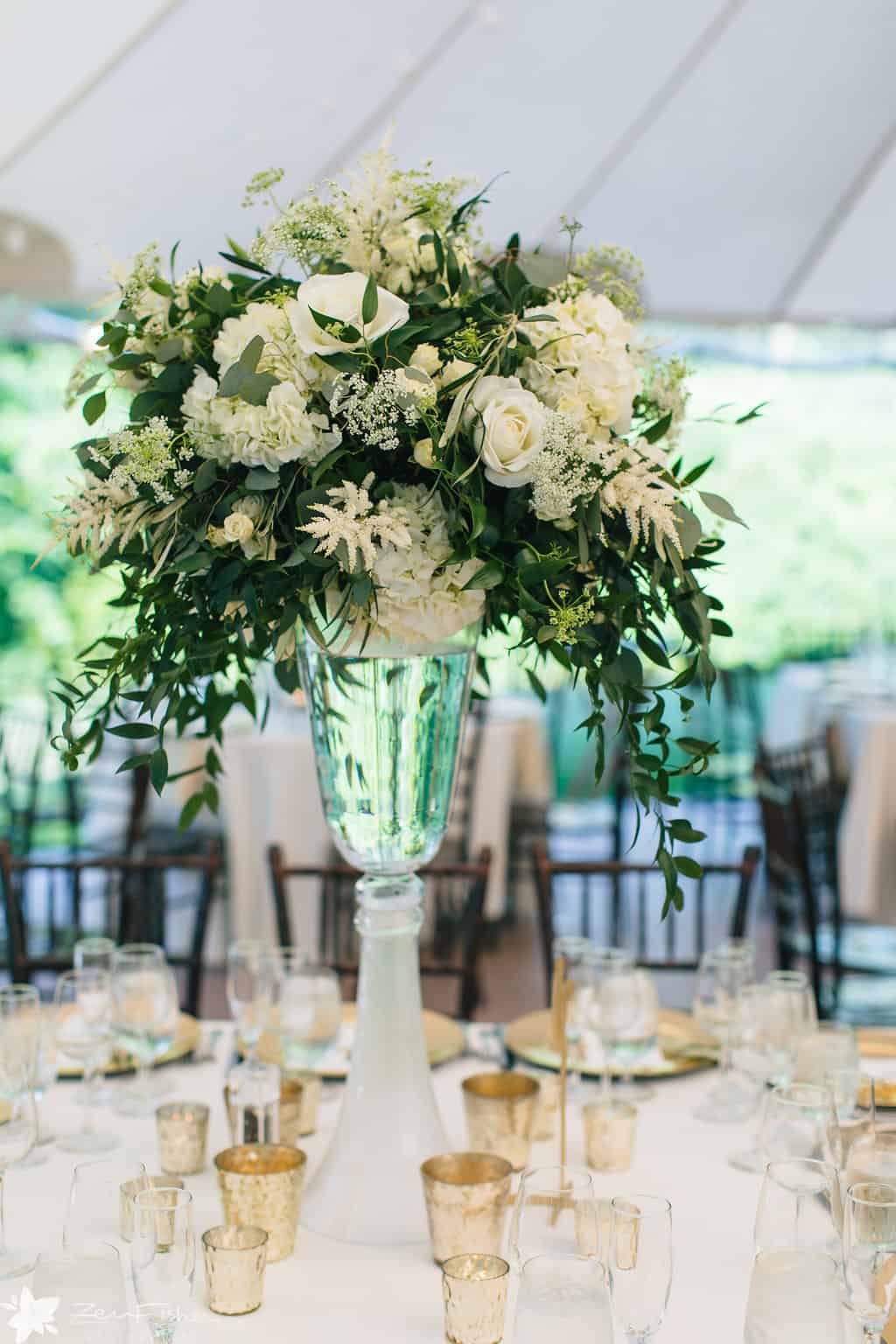 tall green and white wedding centerpiece