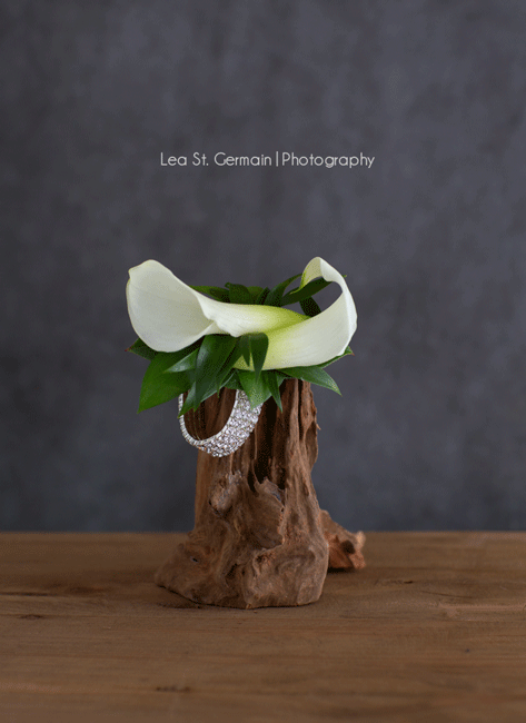 lily wrist corsage for mother at a wedding