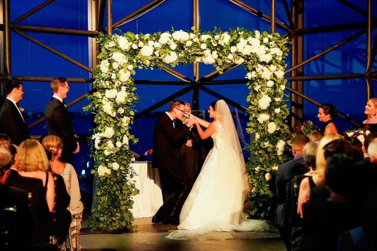 Floral wedding chuppah of greenery and white flowers