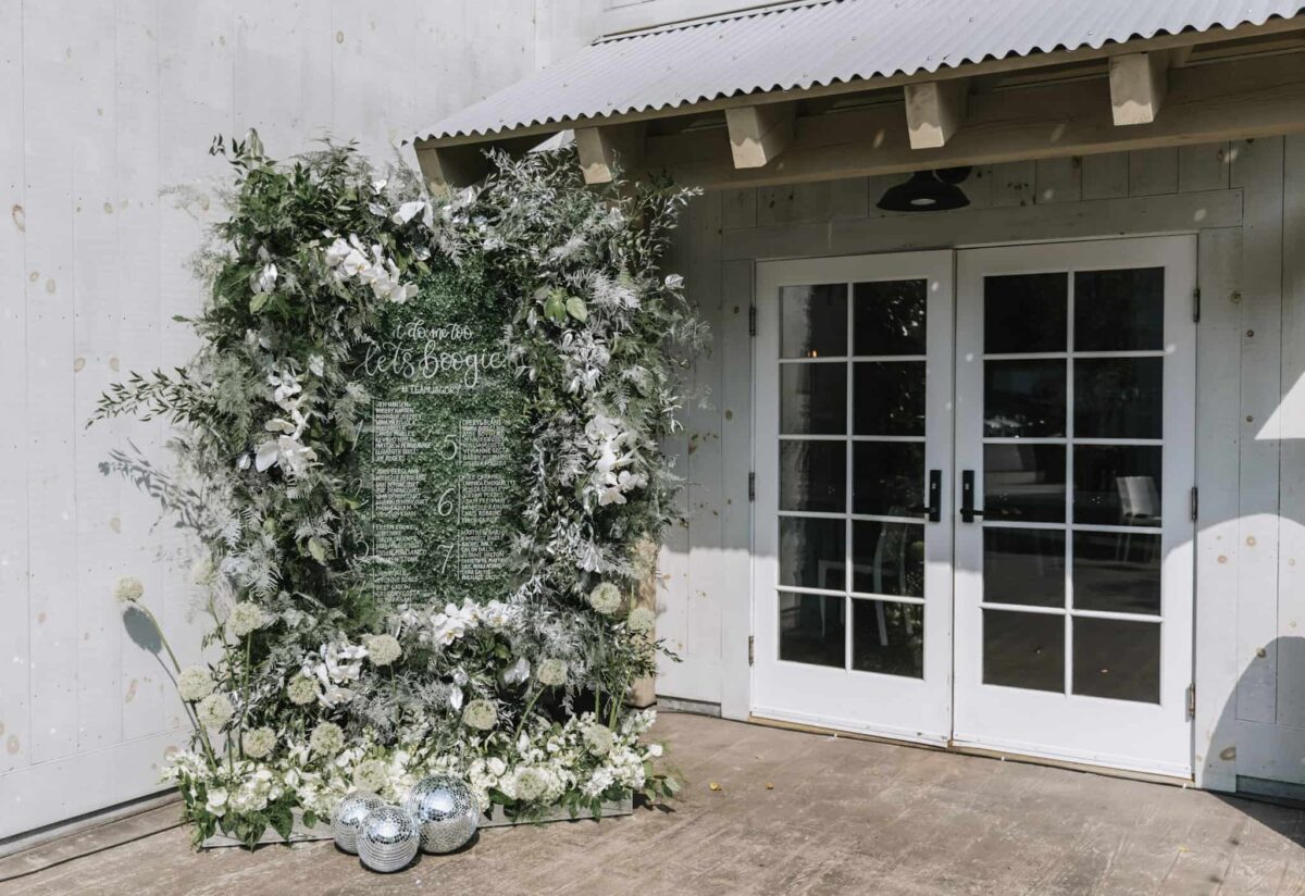 Greenery and White Wedding Seating Display